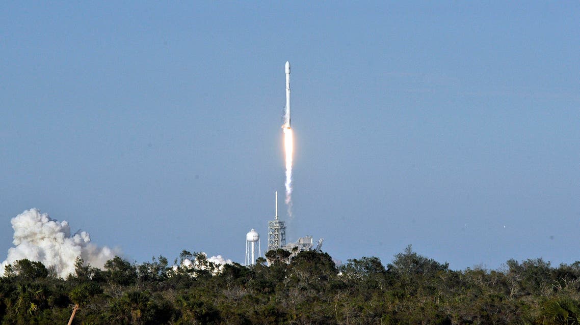 SpaceX's Falcon 9 rocket lifts off from space launch complex 39A at Kennedy Space Center, Florida on March 30, 2017, with an SES communications satellite. SpaceX blasted off a recycled rocket for the first time on, using a booster that had previously flown cargo to the astronauts living at the International Space Station.