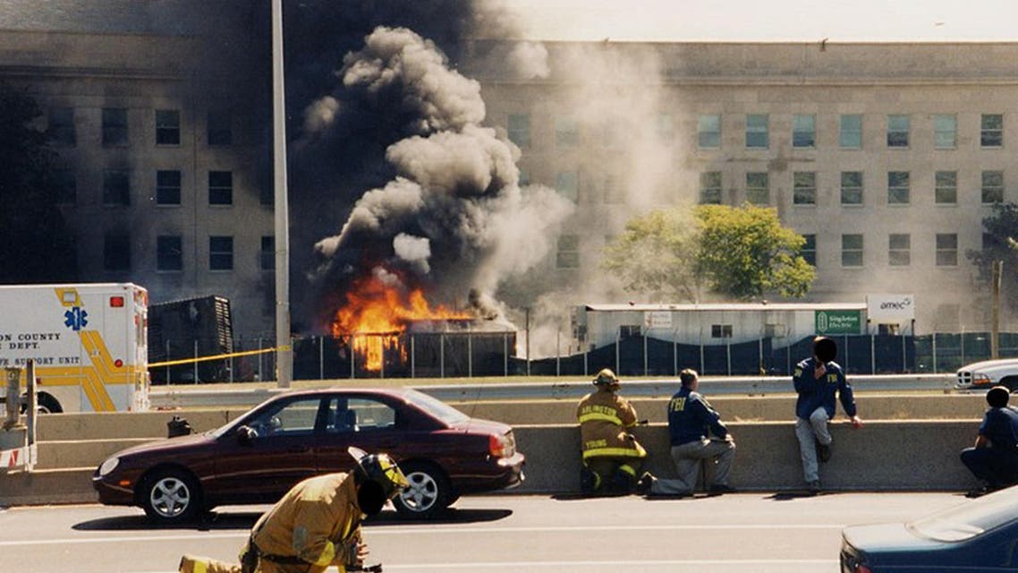 This image by the Federal Bureau of Investigation (FBI) newly released on March 31, 2017, shows first responders at the Pentagon after American Airlines Flight 77 crashed into the Pentagon on September 11, 2001.