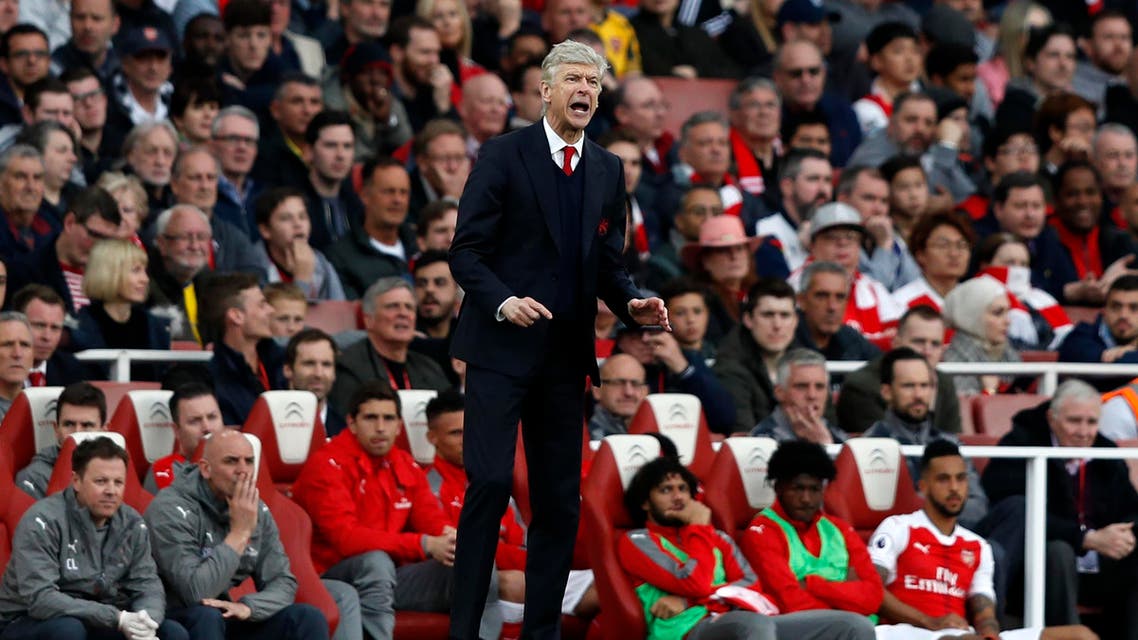 Arsenal's French manager Arsene Wenger (C) gestures on the touchline during the English Premier League football match between Arsenal and Manchester City at the Emirates Stadium in London on April 2, 2017. AFP