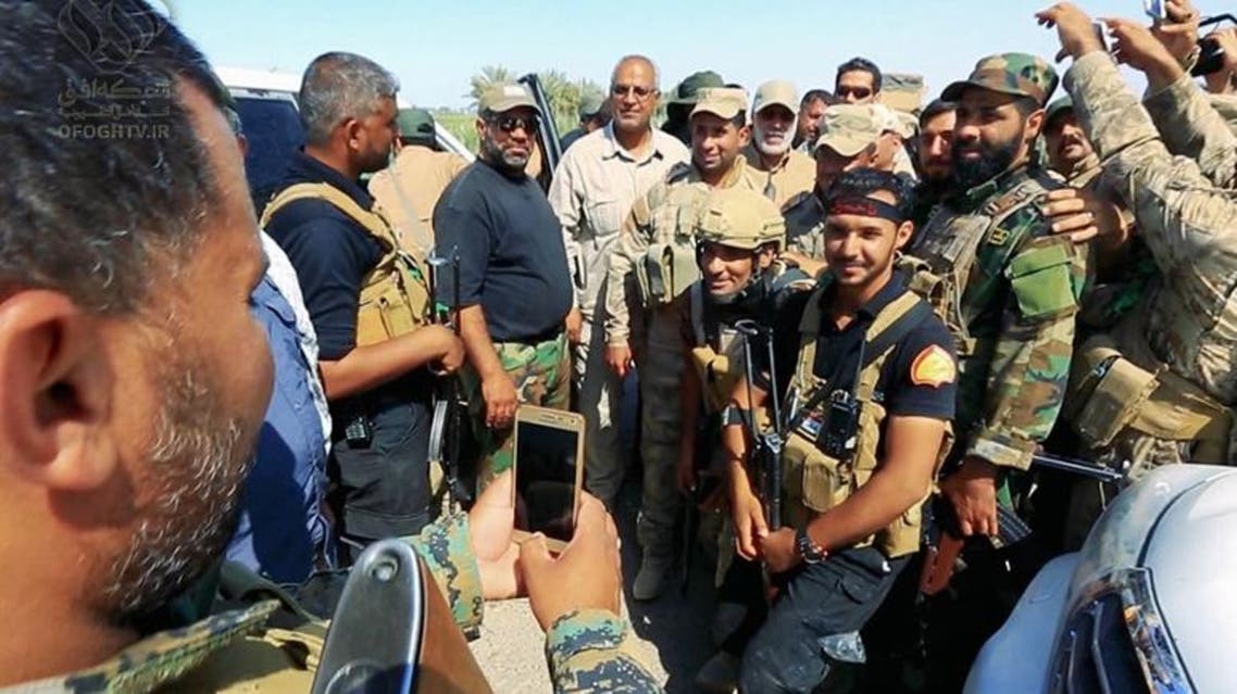المهندس وسط عناصر ميليشيات الحشد الشعبي- تلفزيون أفق الايراني