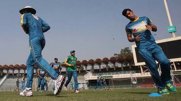 In this March 16, 2017 photo, Pakistan leg-spinner Shadab Khan, right, jogs during a training camp of the national team, at the Gaddafi Stadium in Lahore, Pakistan (File Photo: AP/K.M. Chaudary)