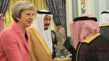 British Prime Minister Theresa May is welcomed as Saudi Arabia's King Salman bin Abdulaziz Al Saud stands next to her in Riyadh, on April 5, 2017. (Courtesy of Saudi Royal Court/Handout via Reuters)
