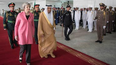 Saudi Arabia's King Salman bin Abdulaziz Al Saud and British Prime Minister Theresa May review the honour guard during a reception ceremony in Riyadh, Saudi Arabia, April 5, 2017. AP