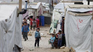 Syrian children are seen inside an informal settlement for Syrian refugees in Bar Elias, Bekaa valley, Lebanon, January 6, 2016. More than 1 million Syrians are enduring another winter as refugees in Lebanon. For some, it is their fifth in a row, displaced by a war that has driven 4.4 million Syrians into neighbouring states from where many are trying to reach Europe. REUTERS/ Jamal Saidi