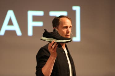 Adidas Executive Board Global Brands member Eric Liedtke holds the new Futurecraft shoe at an unveiling event in New York City, on April 6, 2017. (Reuters)