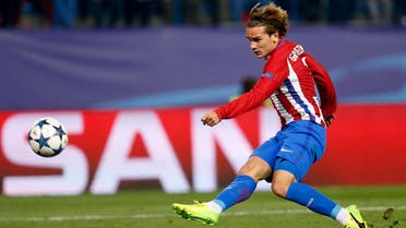 Atletico's Antoine Griezmann kicks the ball during the Champions League round of 16 second leg soccer match between Atletico Madrid and Bayer Leverkusen at the Vicente Calderon stadium in Madrid, Spain, Wednesday, March 15, 2017. (AP)