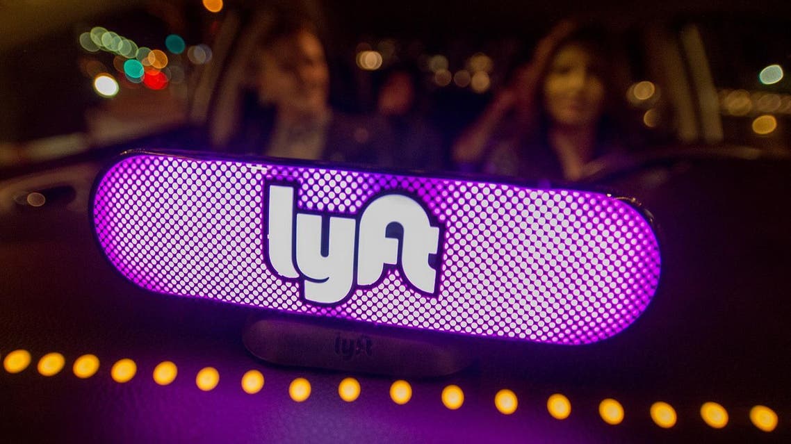 Lyft’s new Amp glows on the dashboard of a car in San Francisco. (AP)