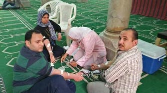 Muslim Egyptians donate blood to deadly church blast victims
