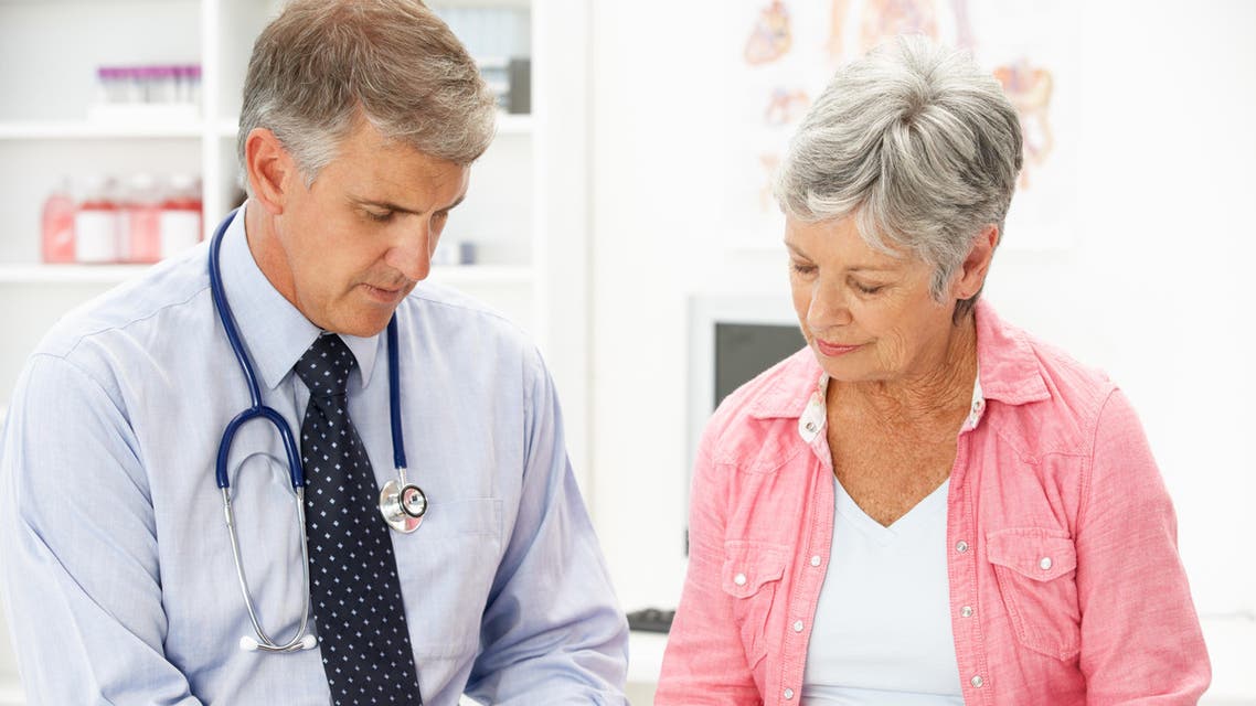 Doctor with female patient
