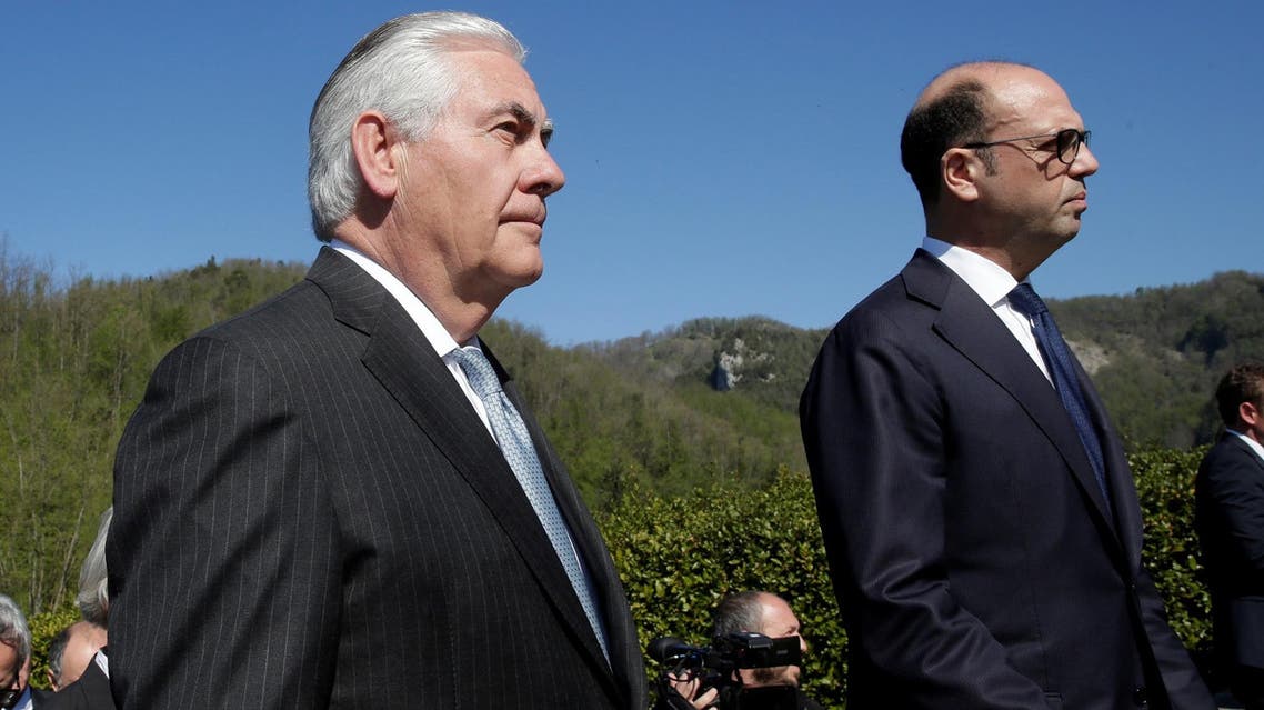 U.S. Secretary of State Rex Tillerson (L) and Italy's Foreign Minister Angelino Alfano arrive to attend a ceremony at the Sant'Anna di Stazzema memorial, dedicated to the victims of the massacre committed in the village of Sant'Anna di Stazzema by Nazis in 1944 during World War II, Italy April 10, 2017. (Reuters)