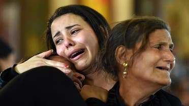 Women mourn for the victims of the blast at the Coptic Christian Saint Mark's church in Alexandria the previous day during a funeral procession at the Monastery of Marmina in the city of Borg El-Arab, east of Alexandria, on April 10, 2017. Egypt prepared to impose a state of emergency after jihadist bombings killed dozens at two churches in the deadliest attacks in recent memory on the country's Coptic Christian minority. AFP