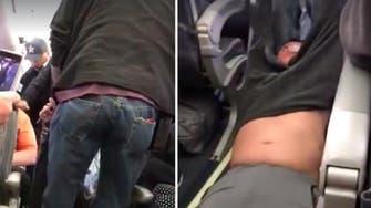 ‘Just kill me!’ United Airlines under fire after passenger dragged from plane