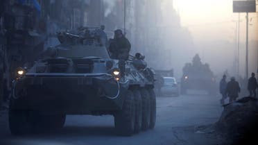 Russian soldiers, on armoured vehicles, patrol a street in Aleppo, Syria February 2, 2017. (Reuters)