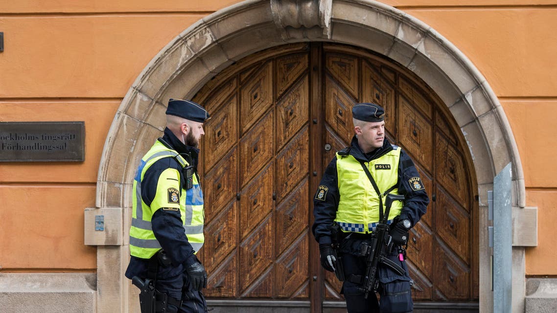 Policemen secure the entrance to the Stockholm District Court where Uzbek national Rakhmat Akilov (not in picture), prime suspect in the Stockholm truck attack, appeared in court on April 11, 2017. (AFP)
