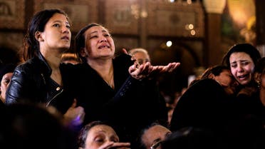 Women cry during the funeral for those killed in a Palm Sunday church attack in Alexandria Egypt, at the Mar Amina church, Monday, April 10, 2017. (AP)