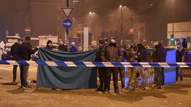 Italian police and forensics experts gather around the body of suspected Berlin truck attacker Anis Amri after he was shot dead in Milan on December 23, 2016 (File Photo: AFP/Daniele Bennati)
