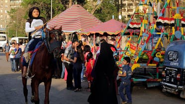 A girl rides a horse near the Nile river as people celebrate the spring holiday of Sham el-Nessim in Cairo April 21, 2014. (File photo: Reuters)