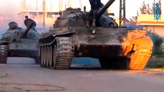 Syrian army regains key town in north Hama province