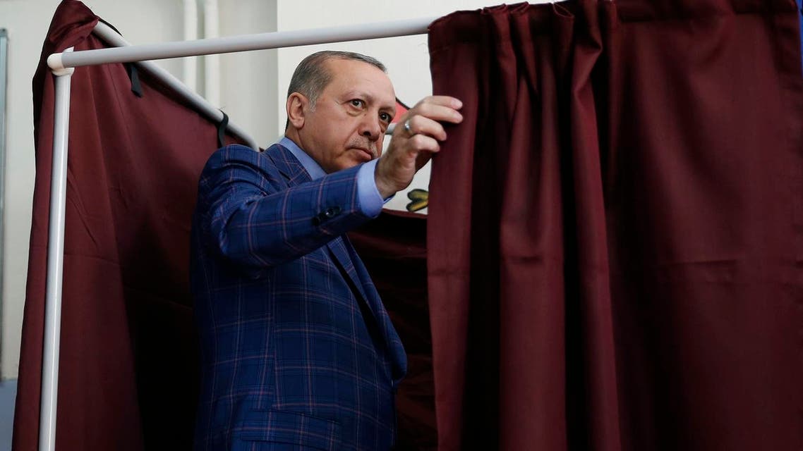 Turkey’s President Recep Tayyip Erdogan enters a voting booth inside a polling station in Istanbul, Turkey, on Sunday, April 16, 2017 (Photo: AP/Lefteris Pitarakis)