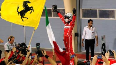 Ferrari driver Sebastian Vettel of Germany celebrates after winning the Bahrain Formula One Grand Prix, at the Formula One Bahrain International Circuit in Sakhir, Bahrain, Sunday, April 16, 2017. (AP PhotoHassan Ammar)