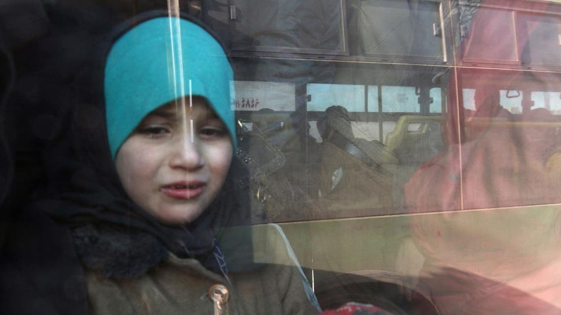 File photo: A girl rides a bus to be evacuated from a rebel-held sector of eastern Aleppo, Syria December 18, 2016. (Reuters)