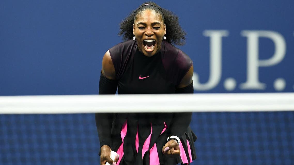 (FILES) This file photo taken on September 8, 2016 shows Serena Williams of the US reacting after winning a point against Karolina Pliskova of Czech Republic during their 2016 US Open Women’s Singles semifinal match at the USTA Billie Jean King National Tennis Center in New York. Tennis great Serena Williams hinted April 19, 2017 that she's expecting her first child, posting a photo of herself on Snapchat captioned "20 weeks". The photo, captured by US media, shows Williams in a yellow swimsuit with what appears to be a baby bump.Williams, 35, hasn't played since beating her sister Venus in the final of the Australian Open in January to clinch a record 23rd Grand Slam singles title. AFP