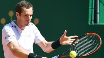 Murray back from layoff to reach Monte Carlo round three