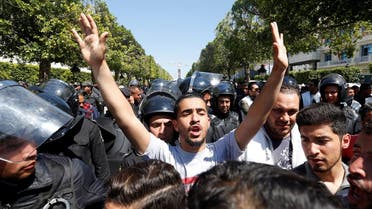 Law students clash with riot police officers, during a demonstration against the government in Tunis. (File photo: Reuters)