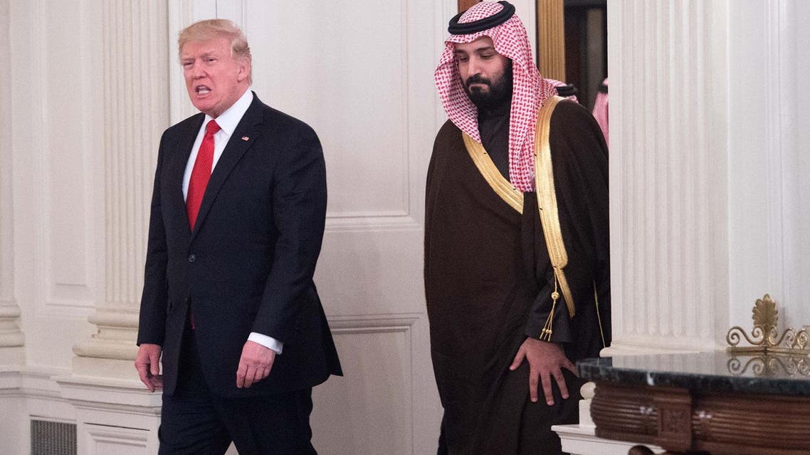 Donald Trump and Saudi Deputy Crown Prince Mohammed bin Salman enter the State Dining Room before lunch at the White House in Washington, DC, on March 14, 2017. (File photo: AFP)