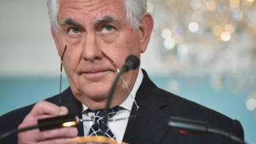 US Secretary of State Rex Tillerson takes off his glasses after delivering a statement on Iran in the Treaty Room of the State Department in Washington, DC, on April 19, 2017. US President Donald Trump's administration has launched a review of the Iran nuclear deal, officials said April 18, branding it a "failed approach" to the threat posed by the Tehran regime. (AFP)