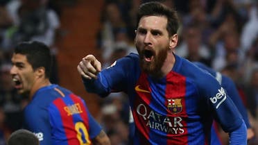 Barcelona's Lionel Messi celebrates scoring their third goal. (Reuters)