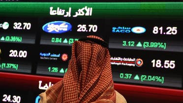 A Saudi investor monitors the stock exchange at the Saudi Stock Exchange, or Tadawul, on December 14, 2016 in the capital Riyadh. (AFP)