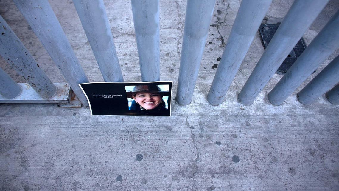 A picture of recently murdered journalist Miroslava Breach, of La Jornada newspaper, is seen outside the Attorney General of the Republic building during a demonstration against violence targeting reporters in Tijuana, Mexico on March 29, 2017. (AFP)