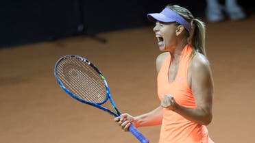 Russia's Maria Sharapova reacts after defeating Italy's Roberta Vinci in their first round match at the WTA tennis Grand Prix in Stuttgart, southwestern Germany, on April 26, 2017. (AFP)
