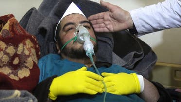 A Syrian man receives treatment at a small hospital in the town of Maaret al-Noman following a suspected toxic gas attack in Khan Sheikhun, a nearby rebel-held town in Syria’s northwestern Idlib province, on April 4, 2017. Warplanes carried out a suspected toxic gas attack that killed at least 35 people including several children, a monitoring group said. The Syrian Observatory for Human Rights said those killed in the town of Khan Sheikhun, in Idlib province, had died from the effects of the gas, adding that dozens more suffered respiratory problems and other symptoms. (AFP)