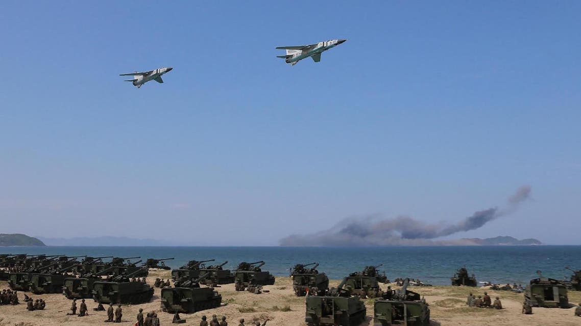 This undated picture released by North Korea’s official news agency on April 26, 2017 shows the combined fire demonstration of the services of the Korean People’s Army in celebration of its 85th founding anniversary at the airport of eastern front. (AFP)