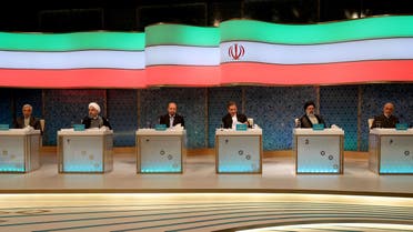 Iranian presidential candidates (L to R) Mostafa Hashemitaba, Hassan Rouhani, Mohammad Baqer Qalibaf, Eshaq Jahangiri, Ebrahim Raisi and Mostafa Mirsalim attend a live debate on state TV in Tehran on April 28, 2017. (AFP)