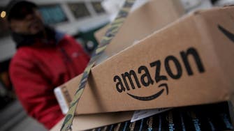 Amazon, Walmart trade barbs on taxes, wages
