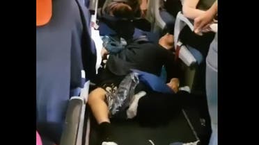 Passengers falling on an Aeroflot plane from Moscow to Bangkok. (Screengrab)