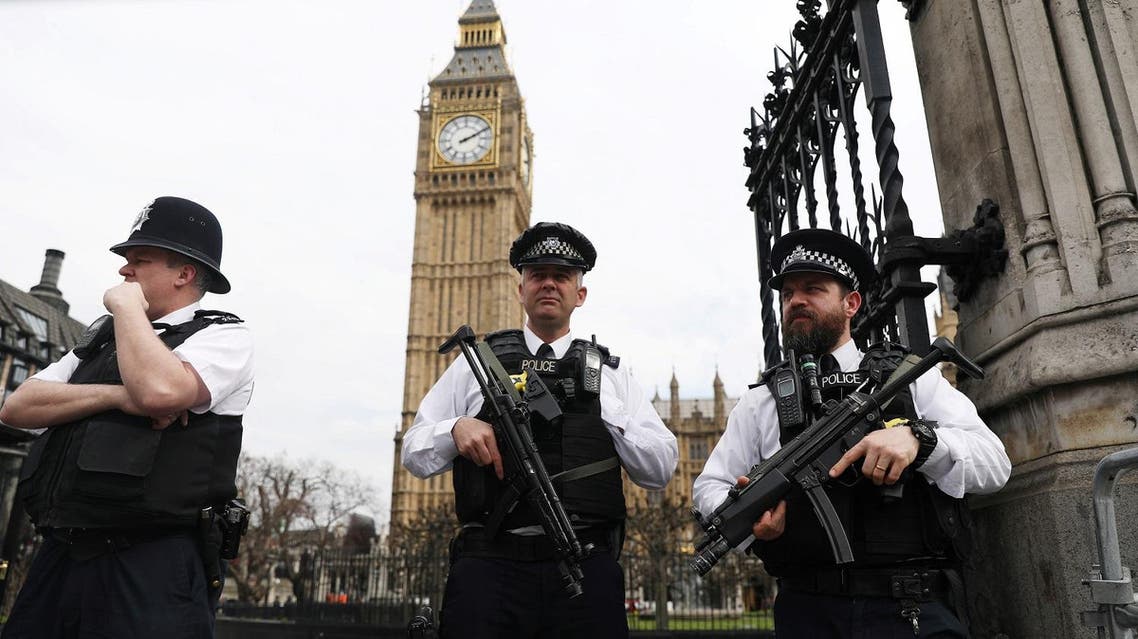 Armed police stand outside the Houses of Parliament in London, Britain March 28, 2017 REUTERS/Neil Hall