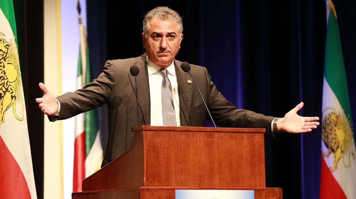 Iran's former crown Prince Reza Pahlavi delivers a speech at the opening of the National Council of Resistance of Iran (NCRI) on April 27, 2013 in Paris. Founded in 1981 in France, the NCRI is the parliament in exile of the "Iranian Resistance", gathering five Iranian opposition political organisations, including the Mujahedeen-e-Khalq (MEK, People's Mujahedin of Iran). AFP PHOTO PIERRE VERDY