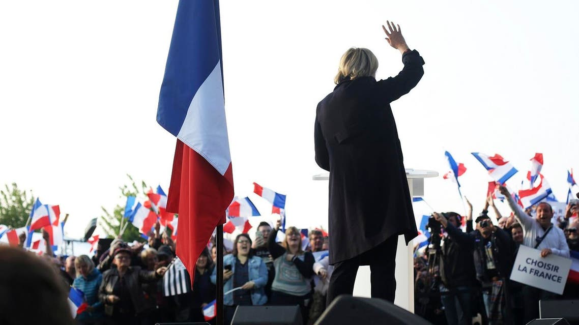 French far-right leader and presidential candidate Marine Le Pen addresses people in Ennemain, northern France, Thursday, May 4, 2017. (AP)