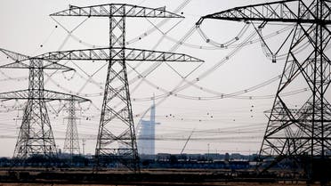 Electric pylons support power cables towards the Al-Qoz area of Dubai. (File photo: Reuters)