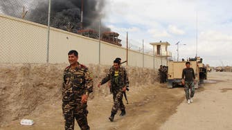 Taliban insurgents overrun a district headquarters