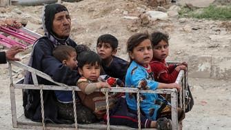 Flooding forces Mosul residents to flee war in rickety boats