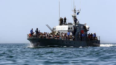 Illegal immigrants, who were rescued by the Libyan coastguard in the Mediterranean off the Libyan coast, arrive at a naval base in the capital Tripoli on May 10, 2017. (AFP)