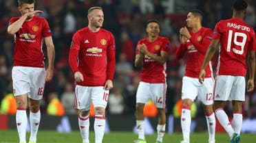 Wayne Rooney celebrates with teammates after the end of the Europa League semifinal second leg soccer match between Manchester United and Celta Vigo at Old Trafford in Manchester on May 11, 2017. (AP)