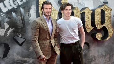 David Beckham and his son Brooklyn pose at the European premiere of "King Arthur: Legend of the Sword" in London, Britain May 10, 2017. (Reuters)