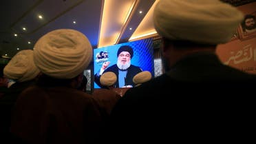 Lebanon's Hezbollah leader Sayyed Hassan Nasrallah addresses his supporters through a screen during a rally commemorating the annual Hezbollah Martyrs' Leaders Day in Jebshit village, southern Lebanon February 16, 2017. (Reuters)
