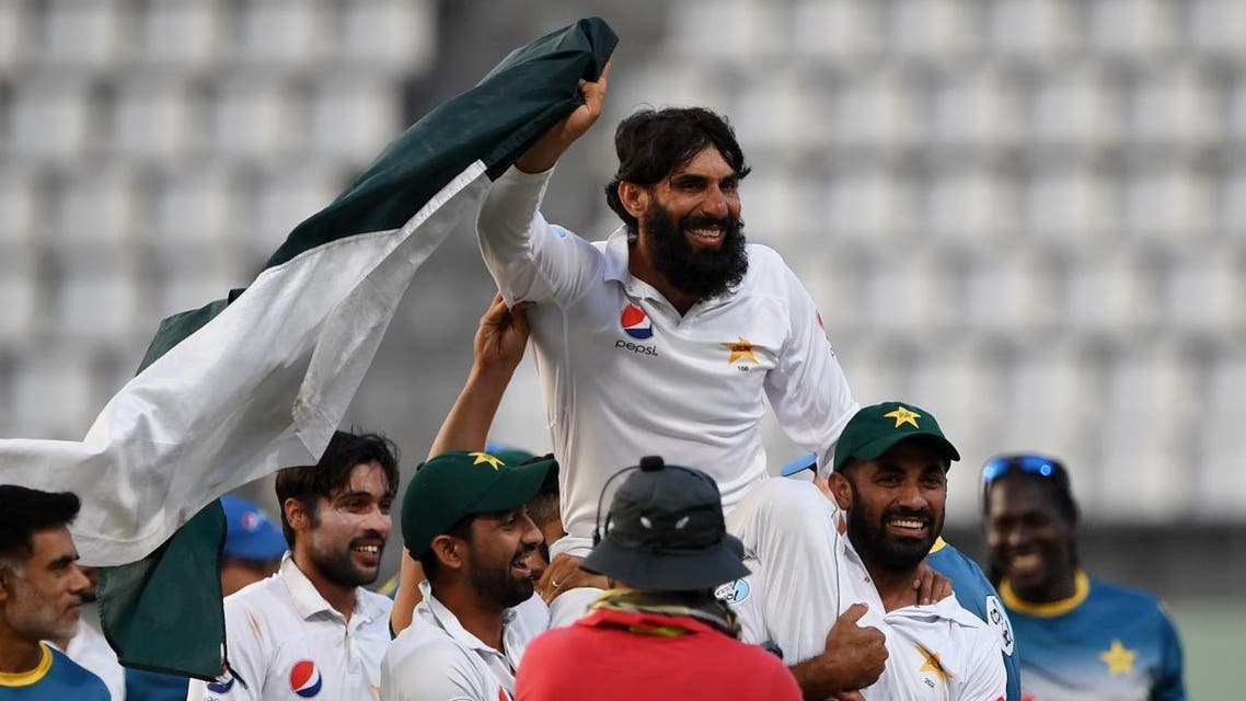 Retiring Pakistan cricket team captain Misbah-ul-Haq is carried by teammates as they celebrate winning the final test match and the series 2-1 against the West Indies. (AFP)